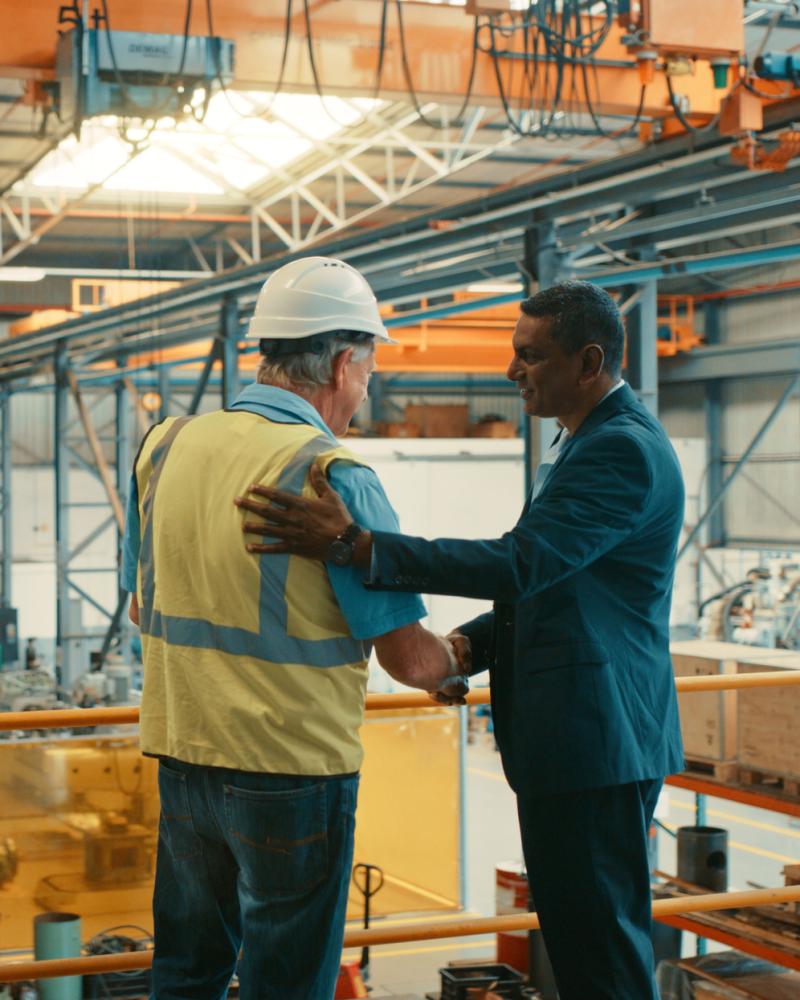 Handshake in a warehouse